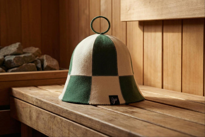 Merino wool sauna hat on a timber sauna bench